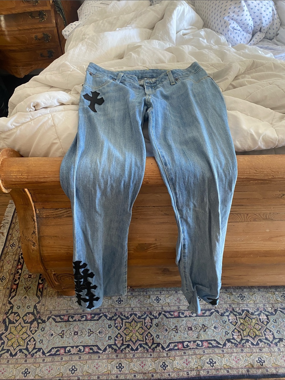 Women’s Light Blue Jeans with Black Cross Appliqué